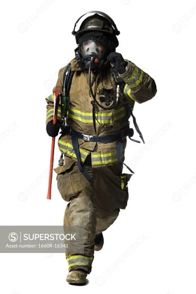 Portrait of a firefighter with mask and axe running