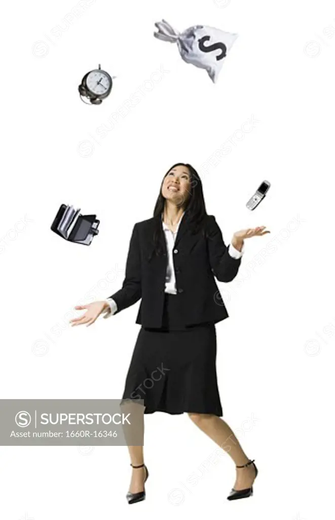 Businesswoman juggling