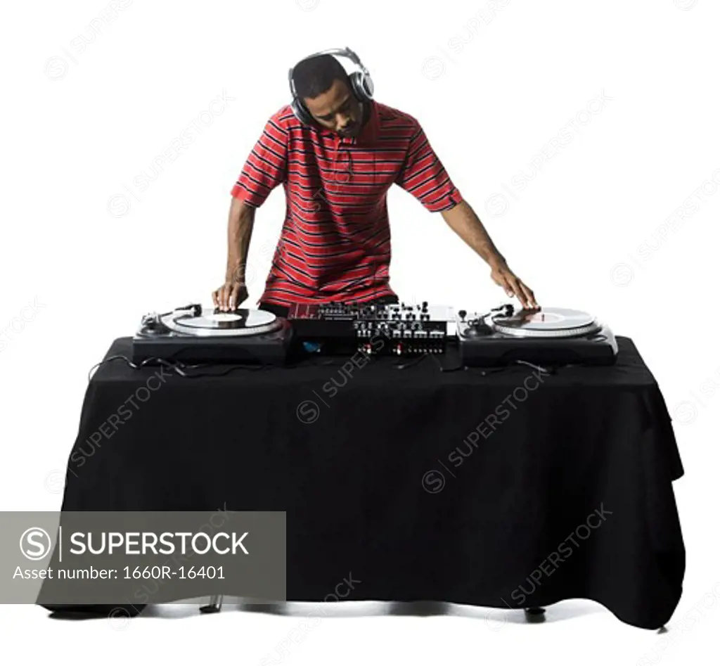 DJ with headphones spinning records