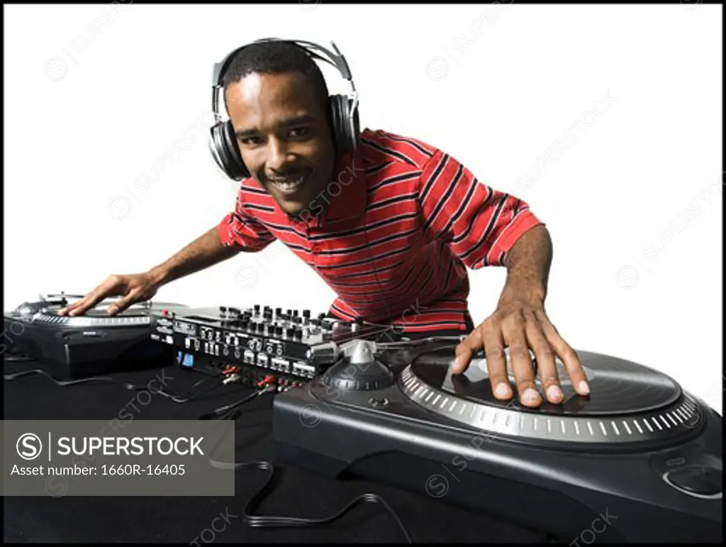 DJ with headphones spinning records