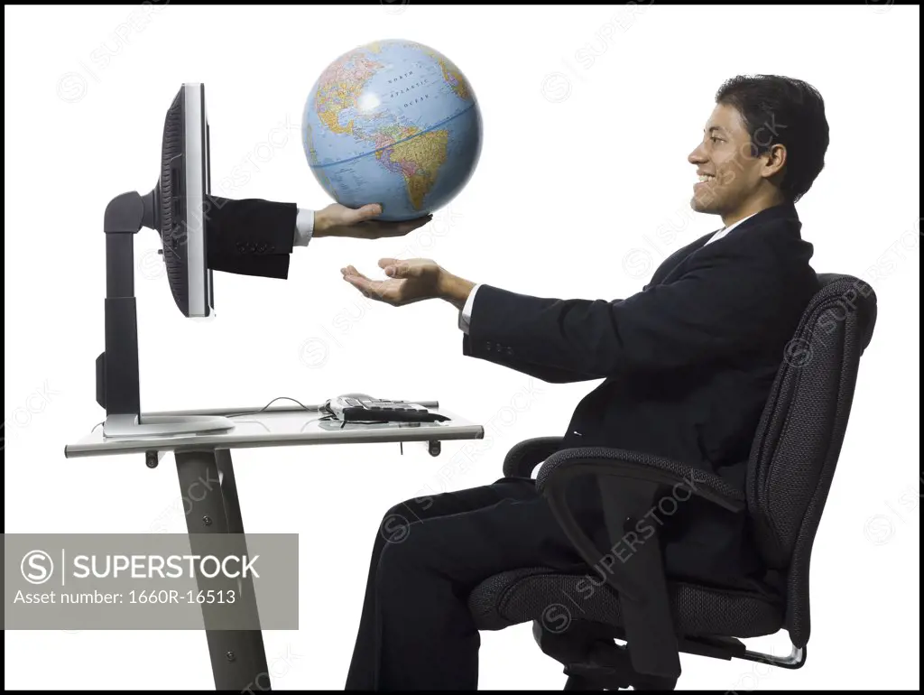 Man receiving globe from hands in monitor