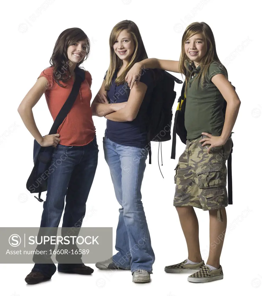 Girl with schoolbags smiling