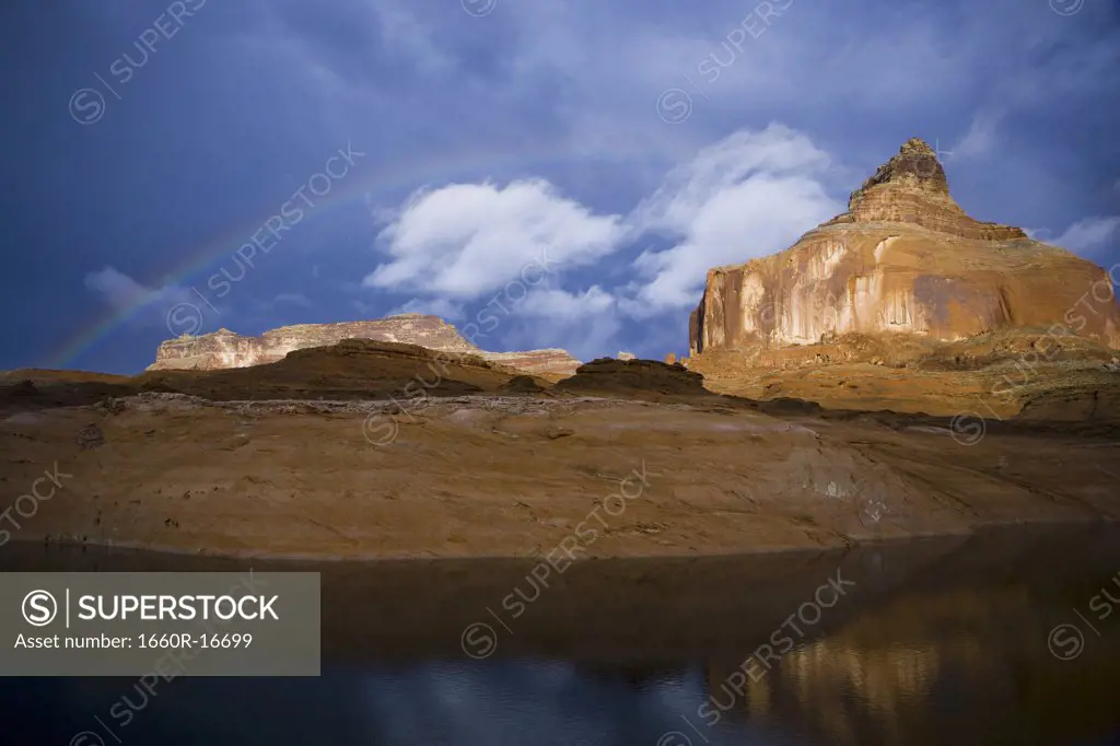 Rock Formation with water and rainbow