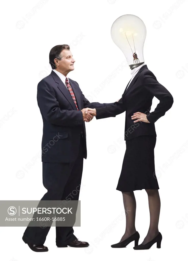 Businesswoman with light bulb instead of head shaking hands with mature businessman