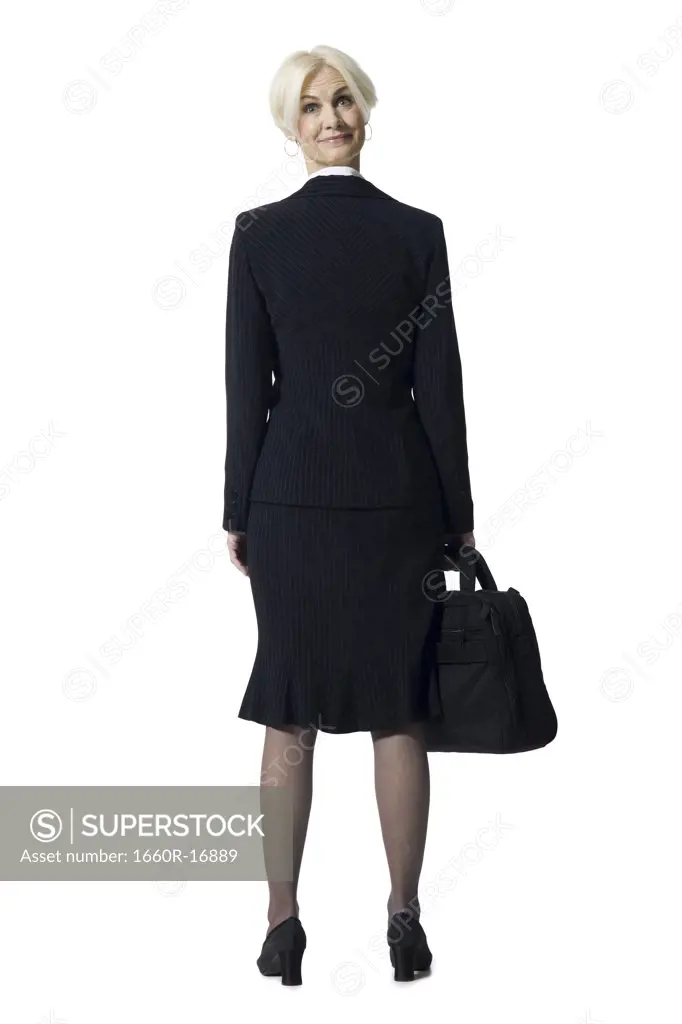 Businesswoman with briefcase and head backwards