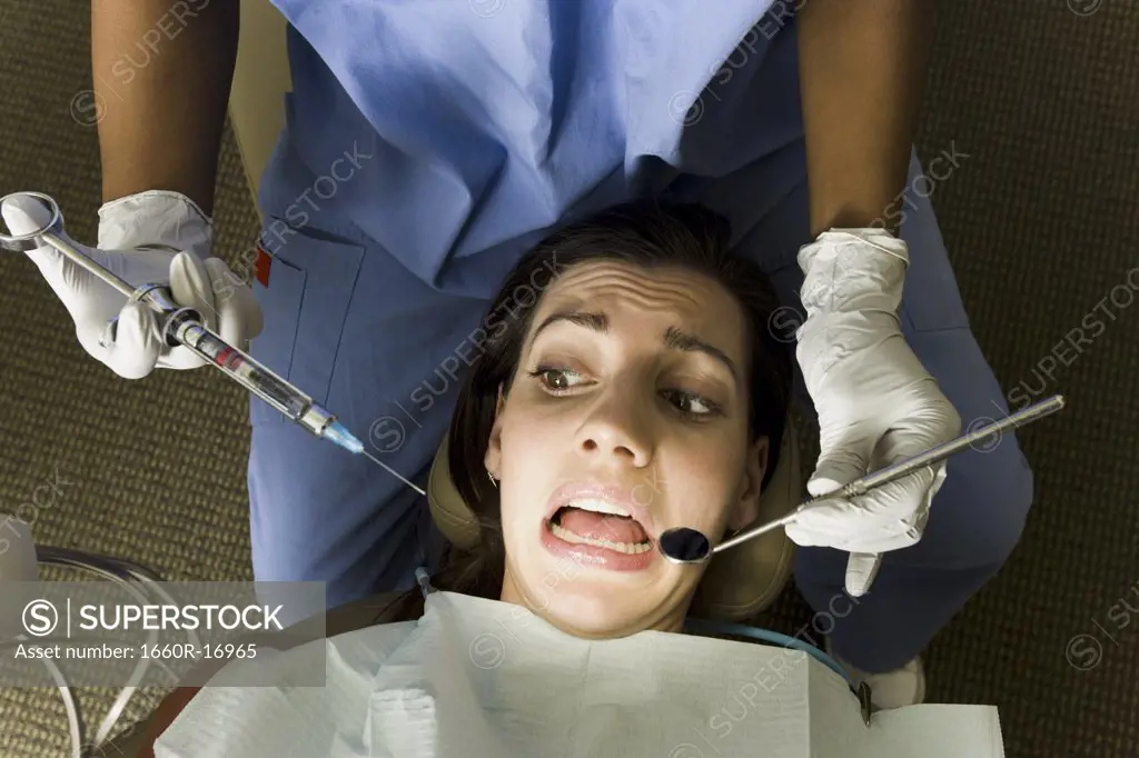 Woman having dental examination