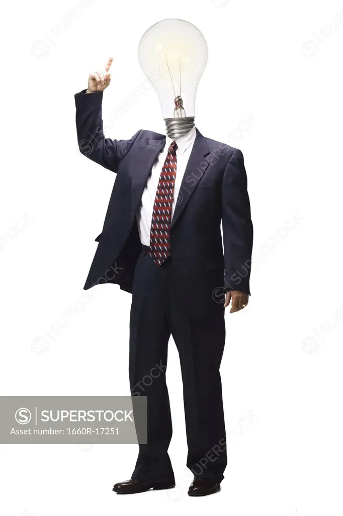 Businessman pointing to light bulb on head