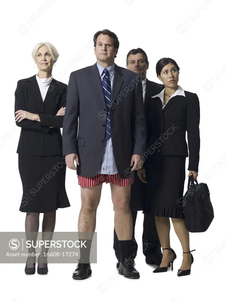 Group of four businesspeople with man in boxers