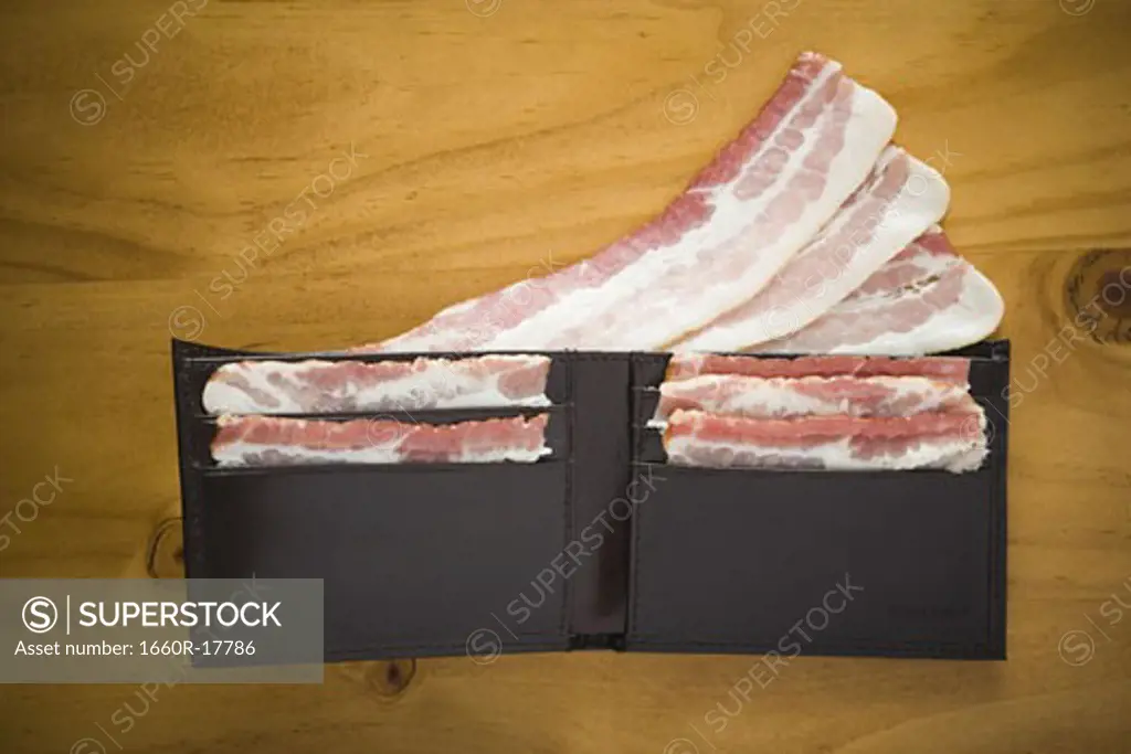Billfold with strips of bacon