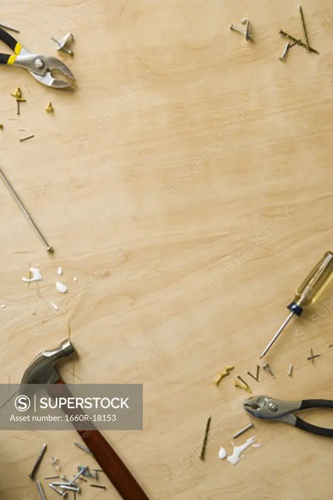 Tools and fasteners on hardwood floor