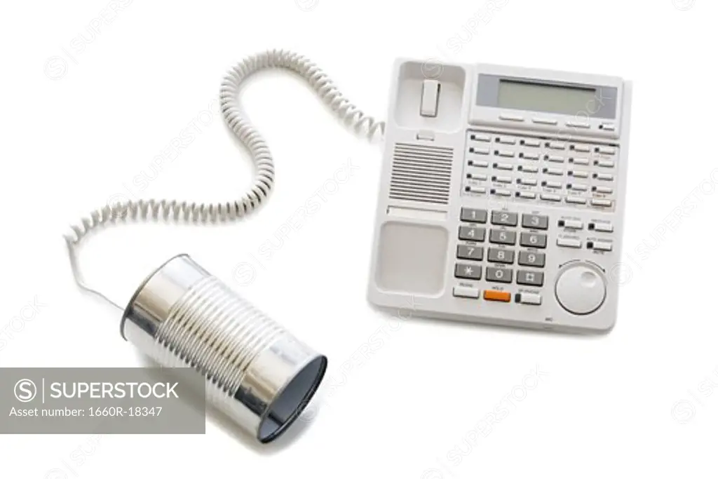 Telephone with can attached to cord