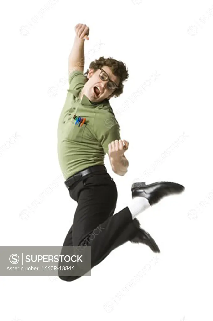 Male nerd with eyeglasses jumping and making funny face