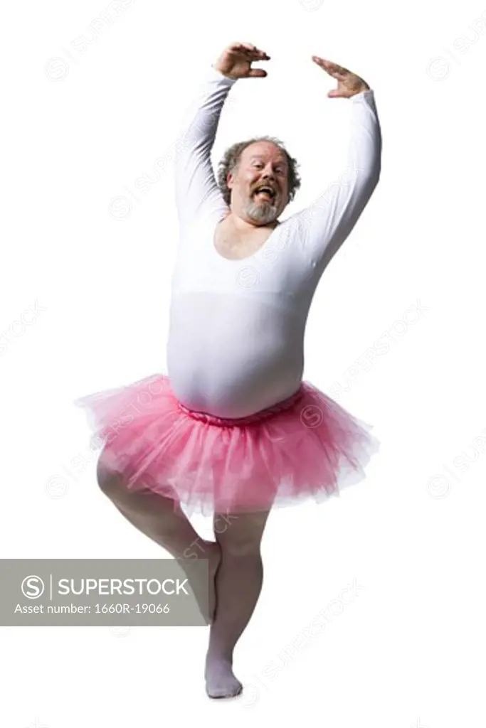 Obese man in tutu dancing and smiling