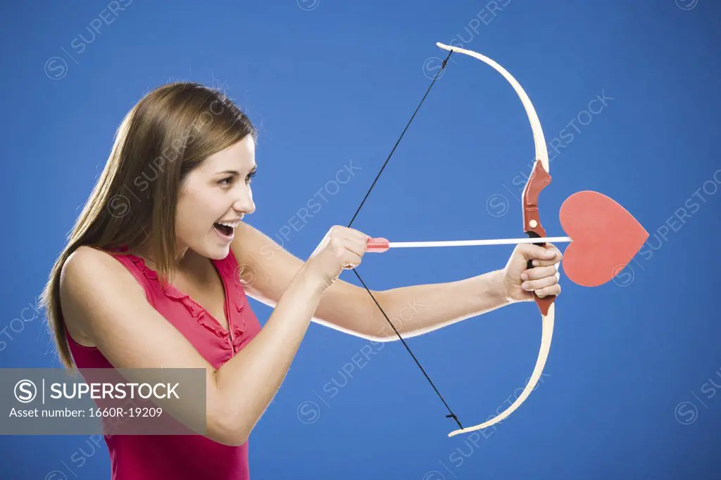 Woman with bow and arrow with heart