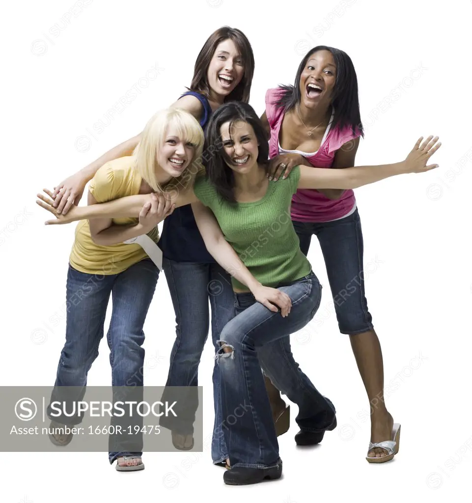 Four women laughing and playing