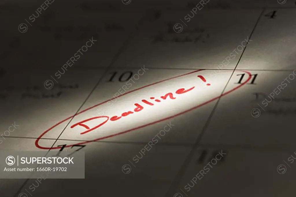 Desk calendar with deadline in red