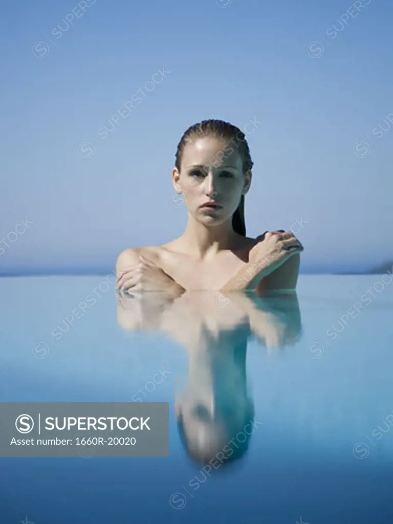 Woman in pool outdoors