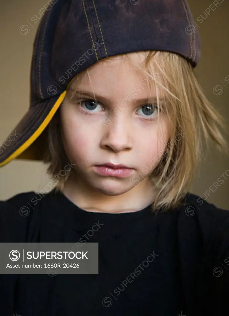 Closeup of boy with baseball cap