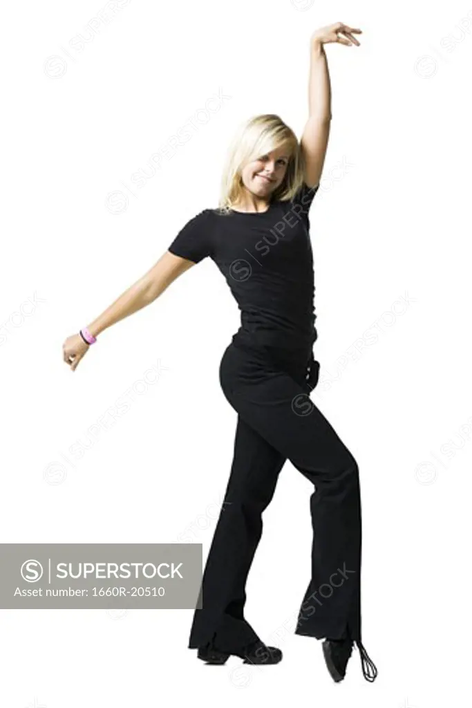 Woman dancing and smiling