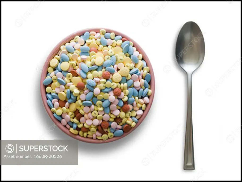 Bowl filled with medication with spoon