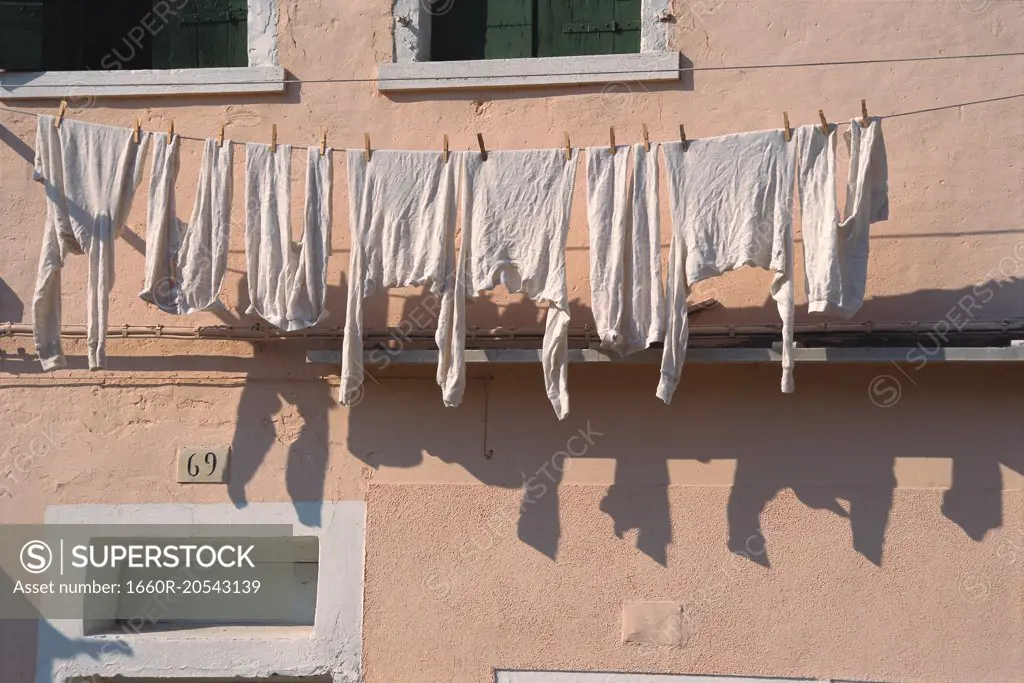 Washing hanging outside building