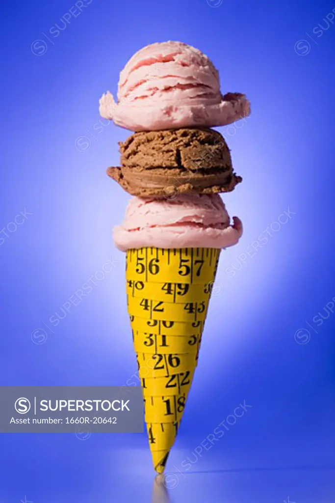 Ice cream cone made out of tape measure with 3 scoops of ice cream.