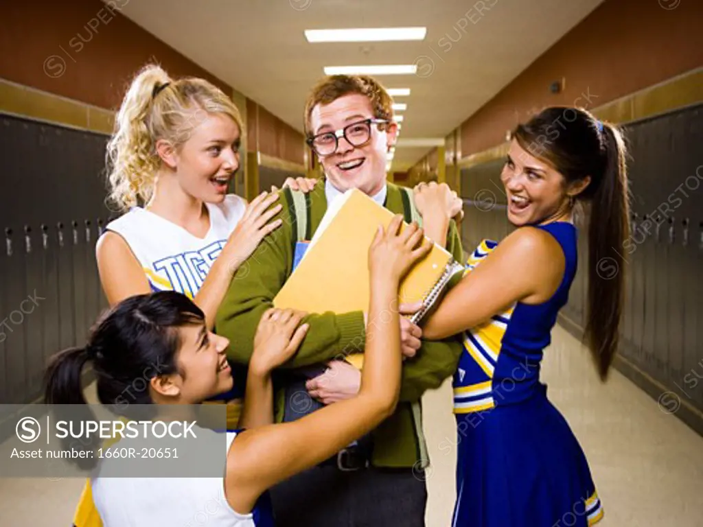 Three female and one male High School Students.