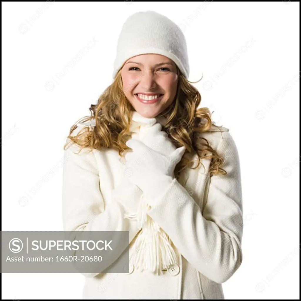young woman in white winter clothes.