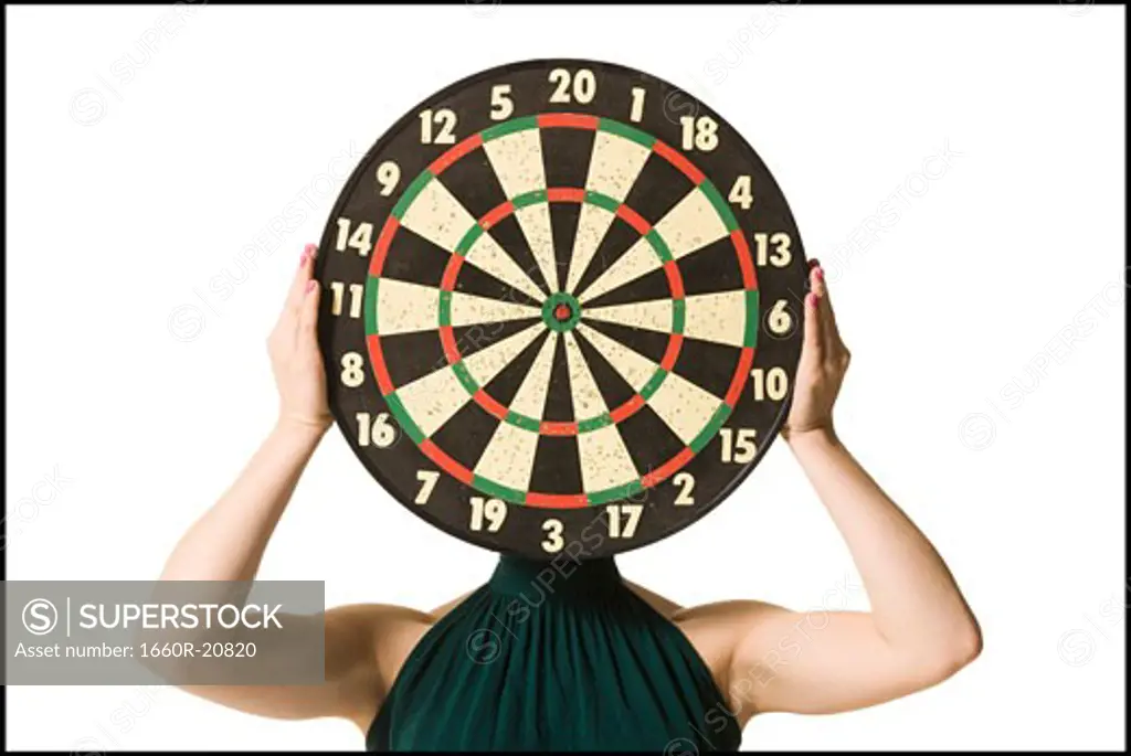 woman with dartboard covering head