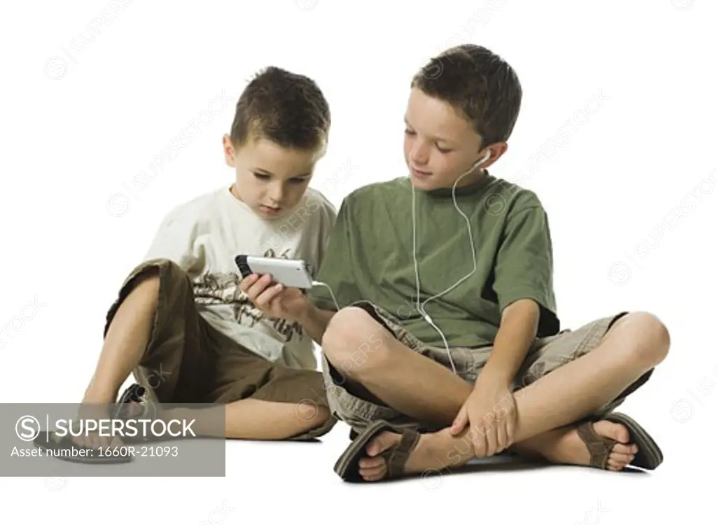 Boy listening to MP3 player.