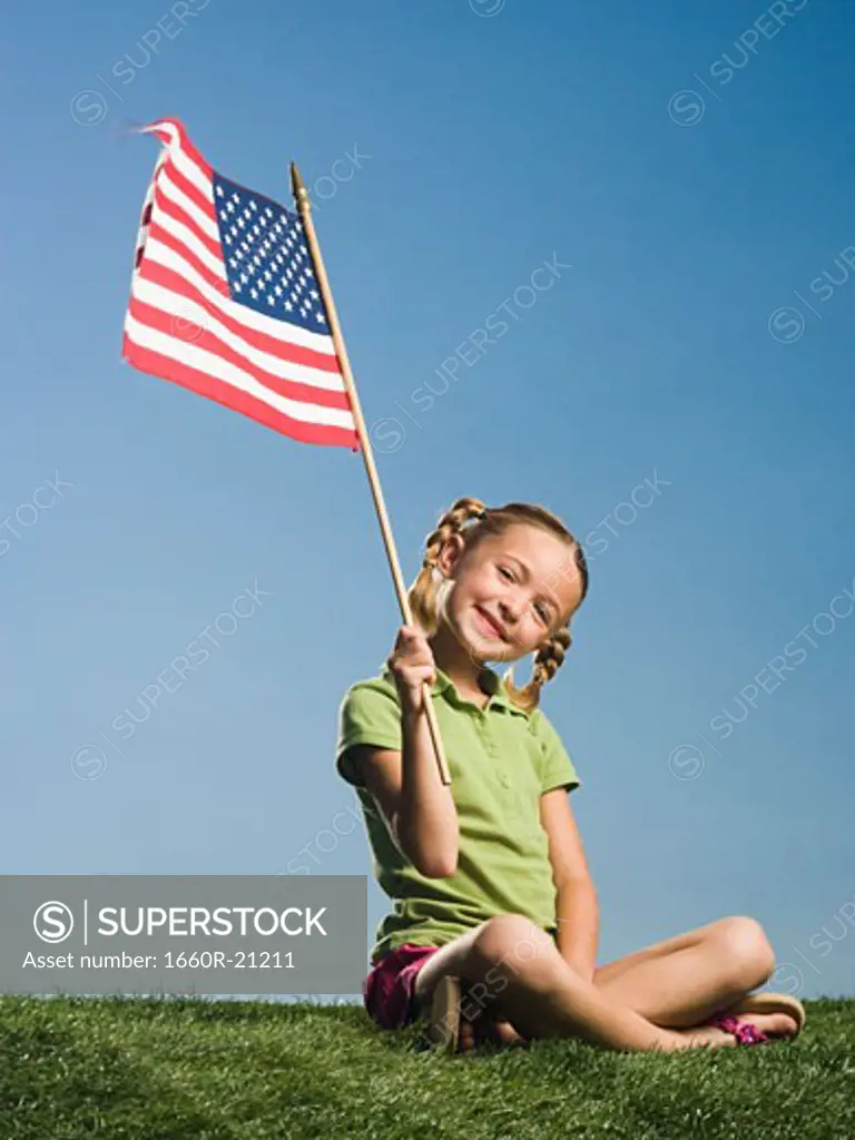 Child with American flag.
