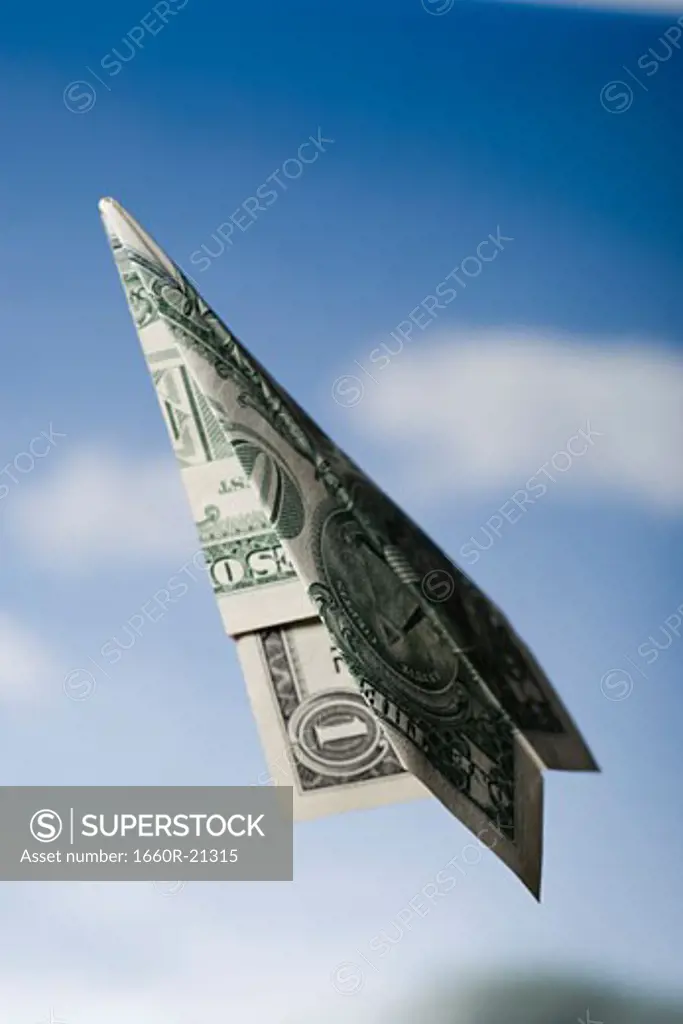 Paper airplane made out of money.