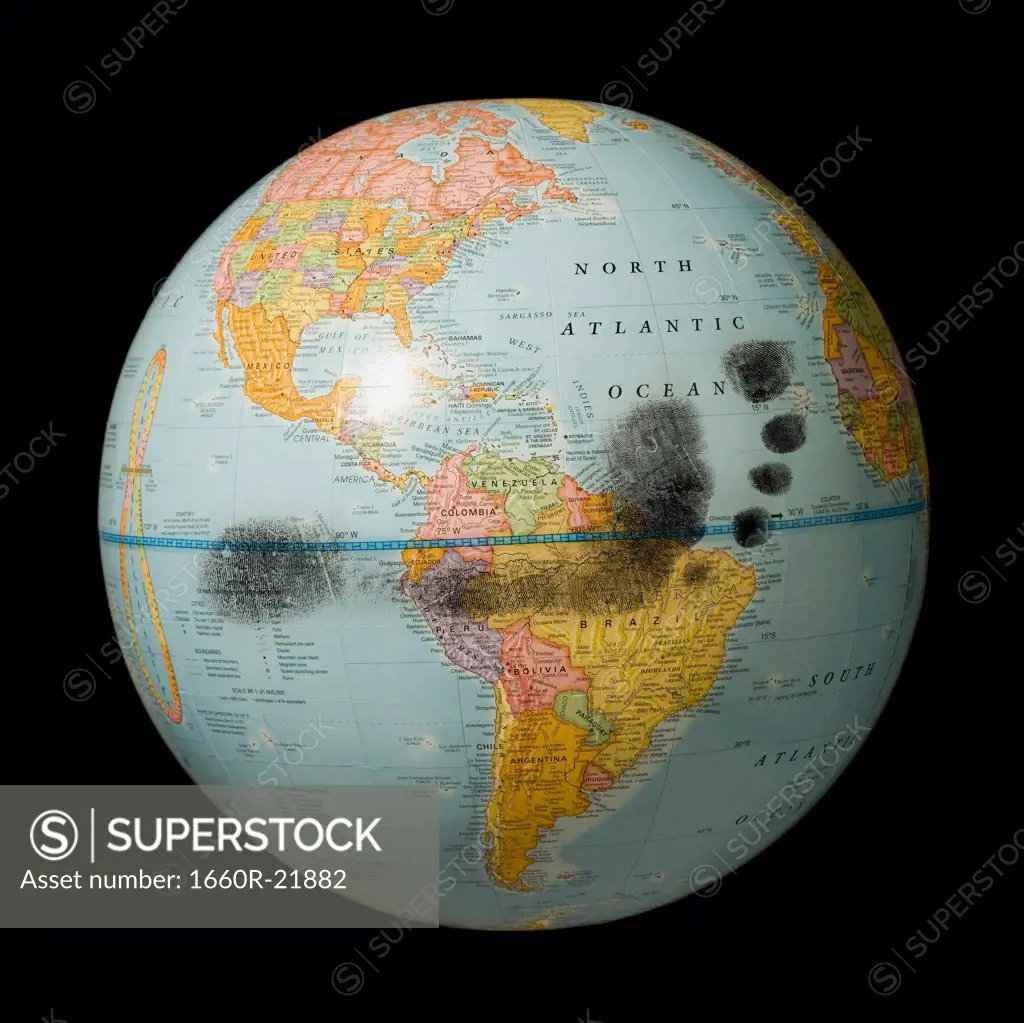 Footprint on a globe.