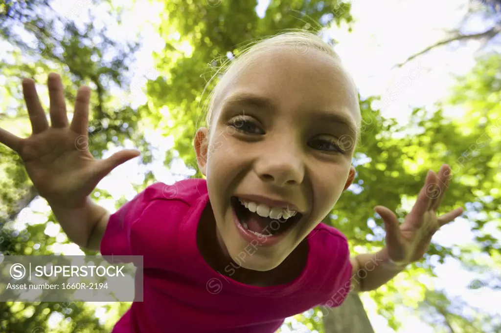 Low angle view of a girl laughing