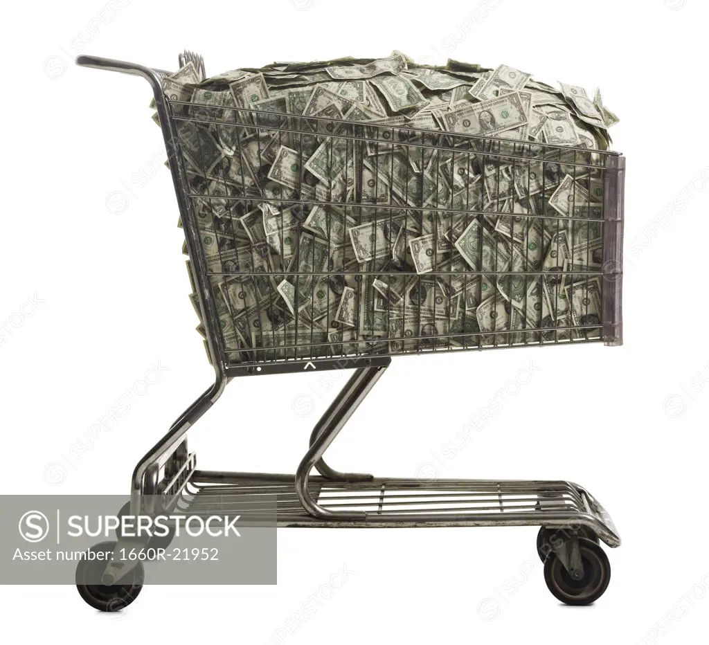 Shopping cart full of American dollars.