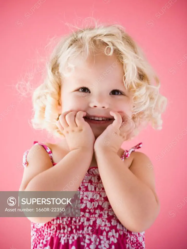 little girl smiling.
