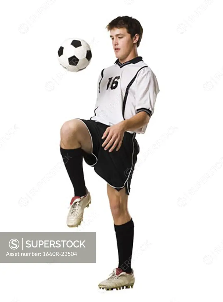 young man with a soccer ball.