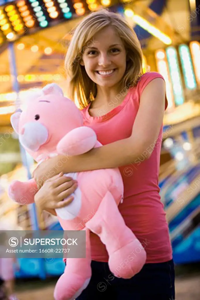 young woman with a stuffed animal