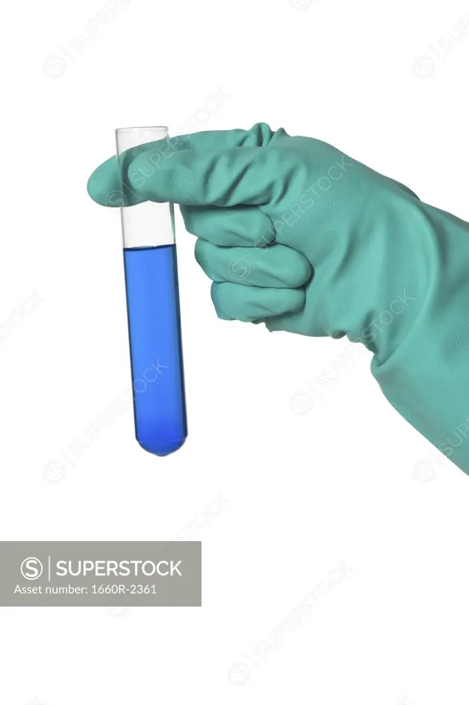 Person holding a test tube