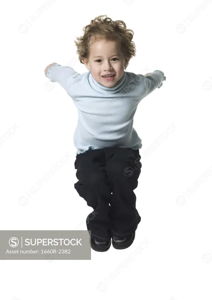 Portrait of a boy jumping