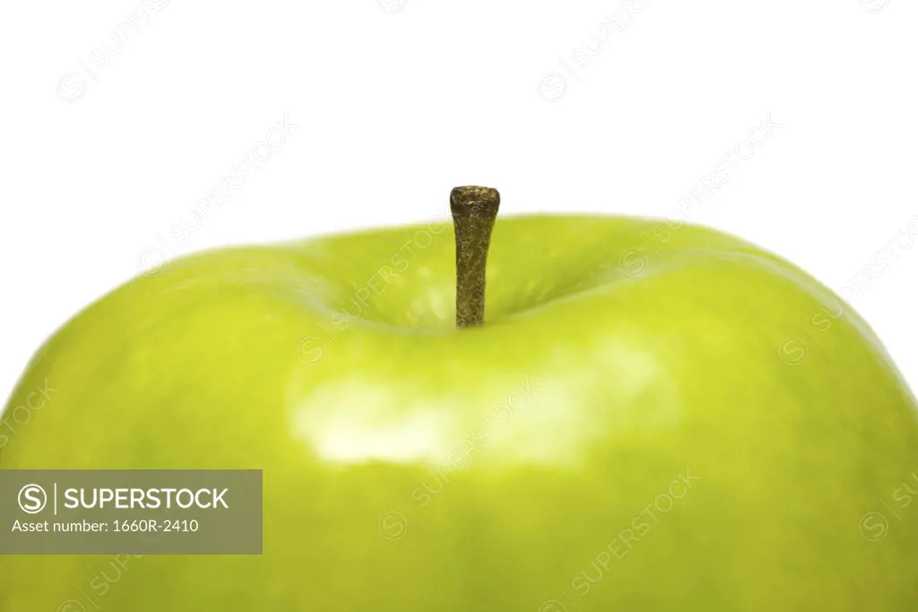 Close-up of a granny smith apple (aphis pomi)
