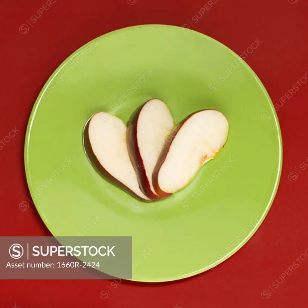 Close-up of apple slices on a plate (Malus domestica)