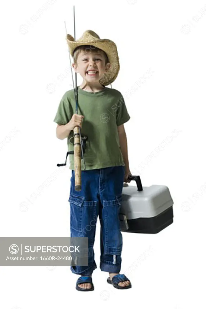 Portrait of a boy holding a fishing rod