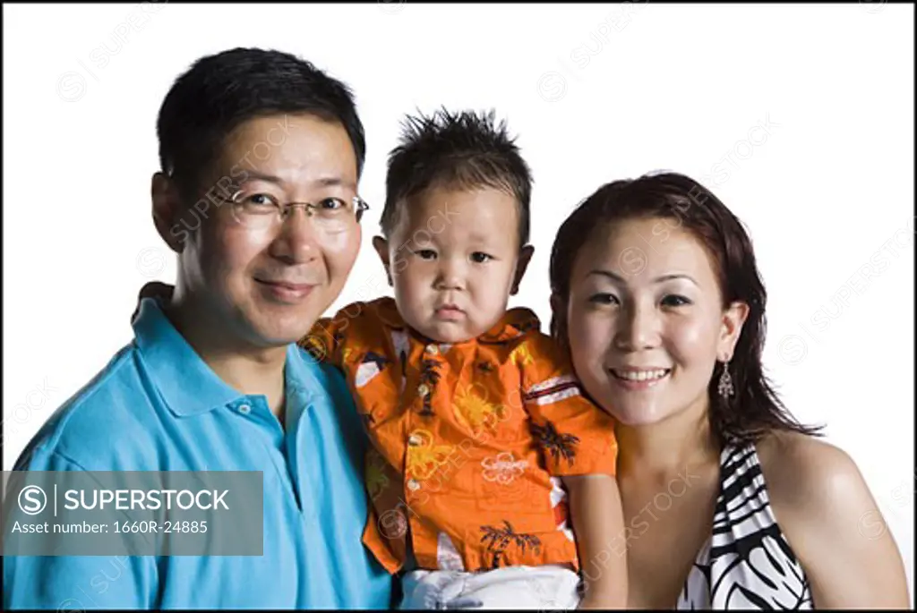 Asian parents with young boy