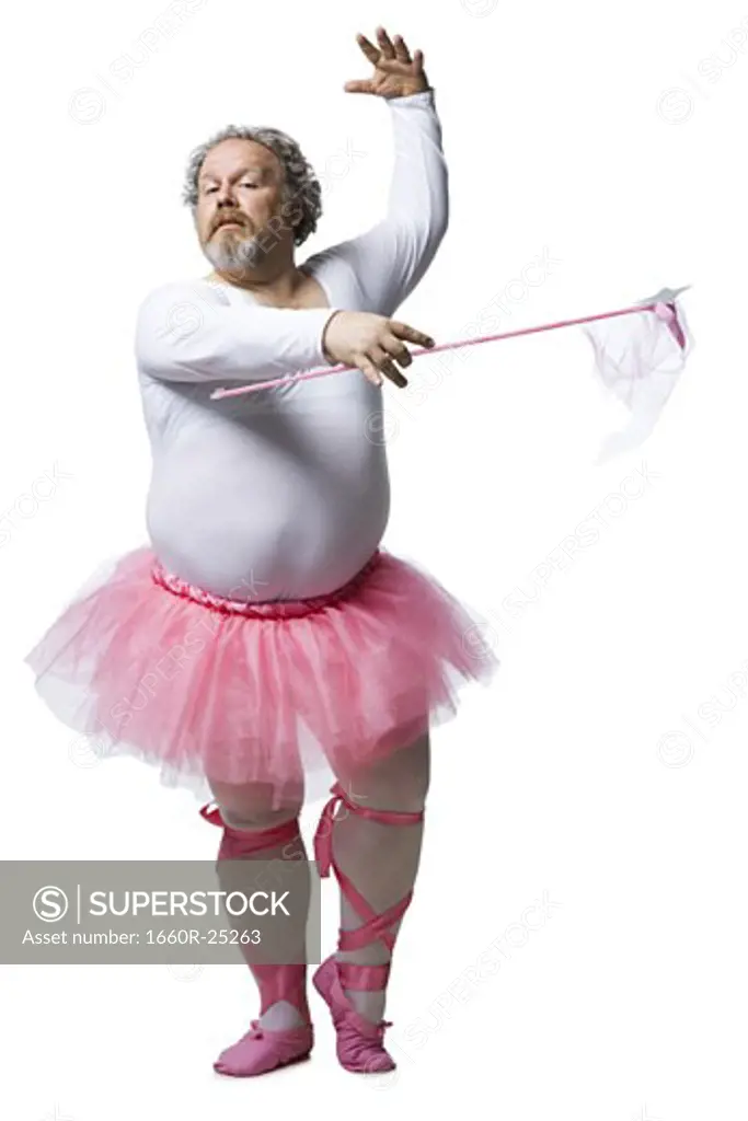 Overweight man in ballerina tutu smiling