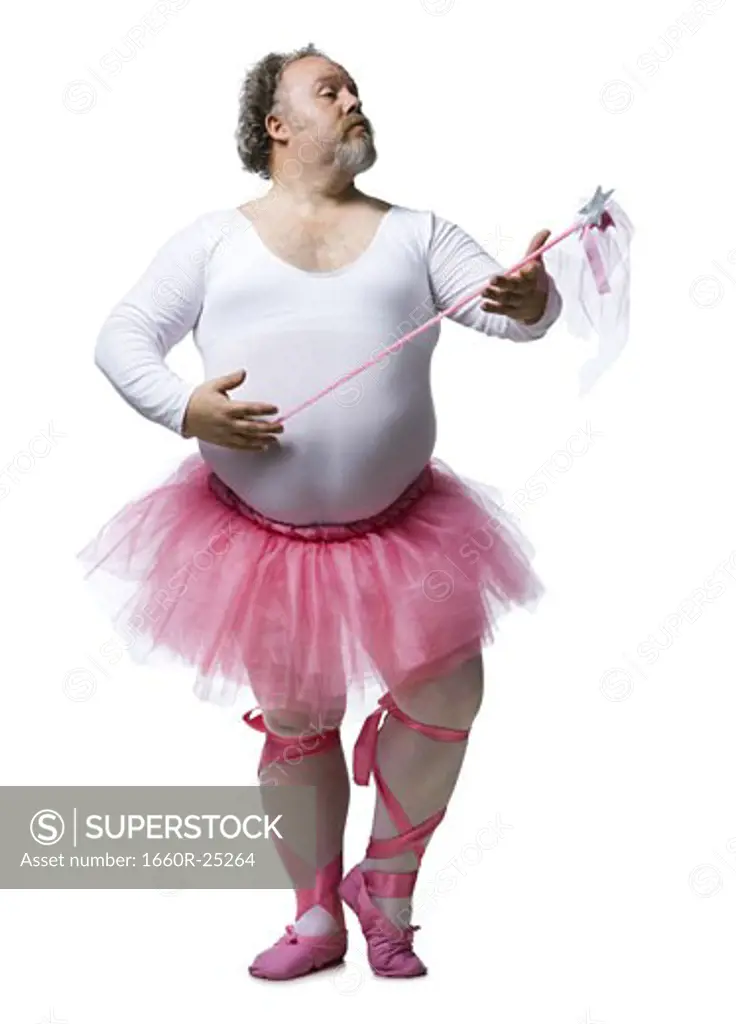 Overweight man in ballerina tutu smiling