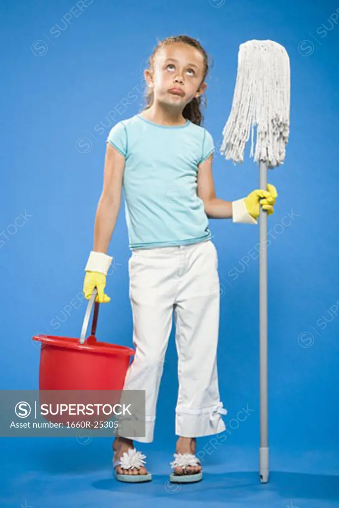 Girl holding mop and bucket with rubber gloves
