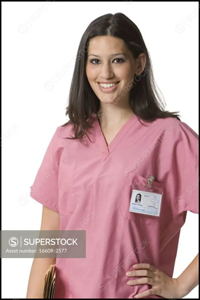 Portrait of a female nurse standing with her hand on her hip