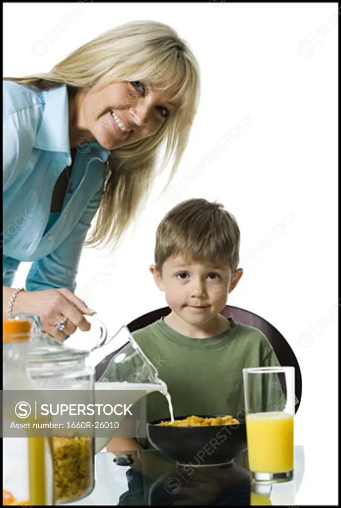 Portrait of a mother and her son at the breakfast table