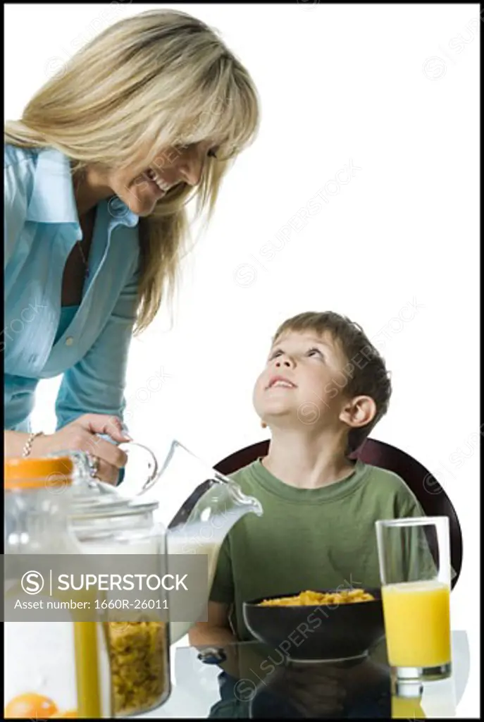 Portrait of a mother and her son at the breakfast table